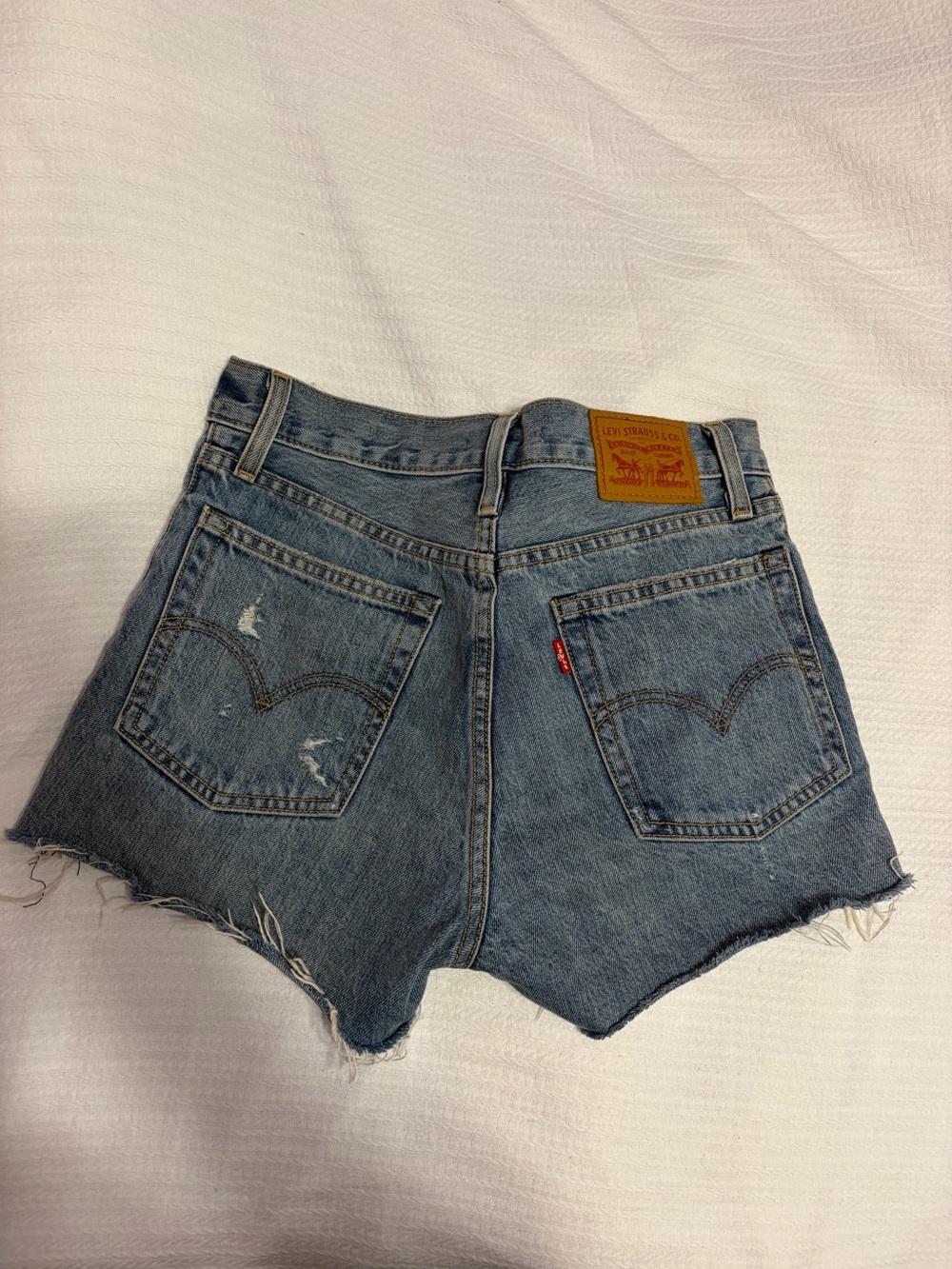 Levi's Medium Blue Distressed High-Rise Cutoff Denim Shorts